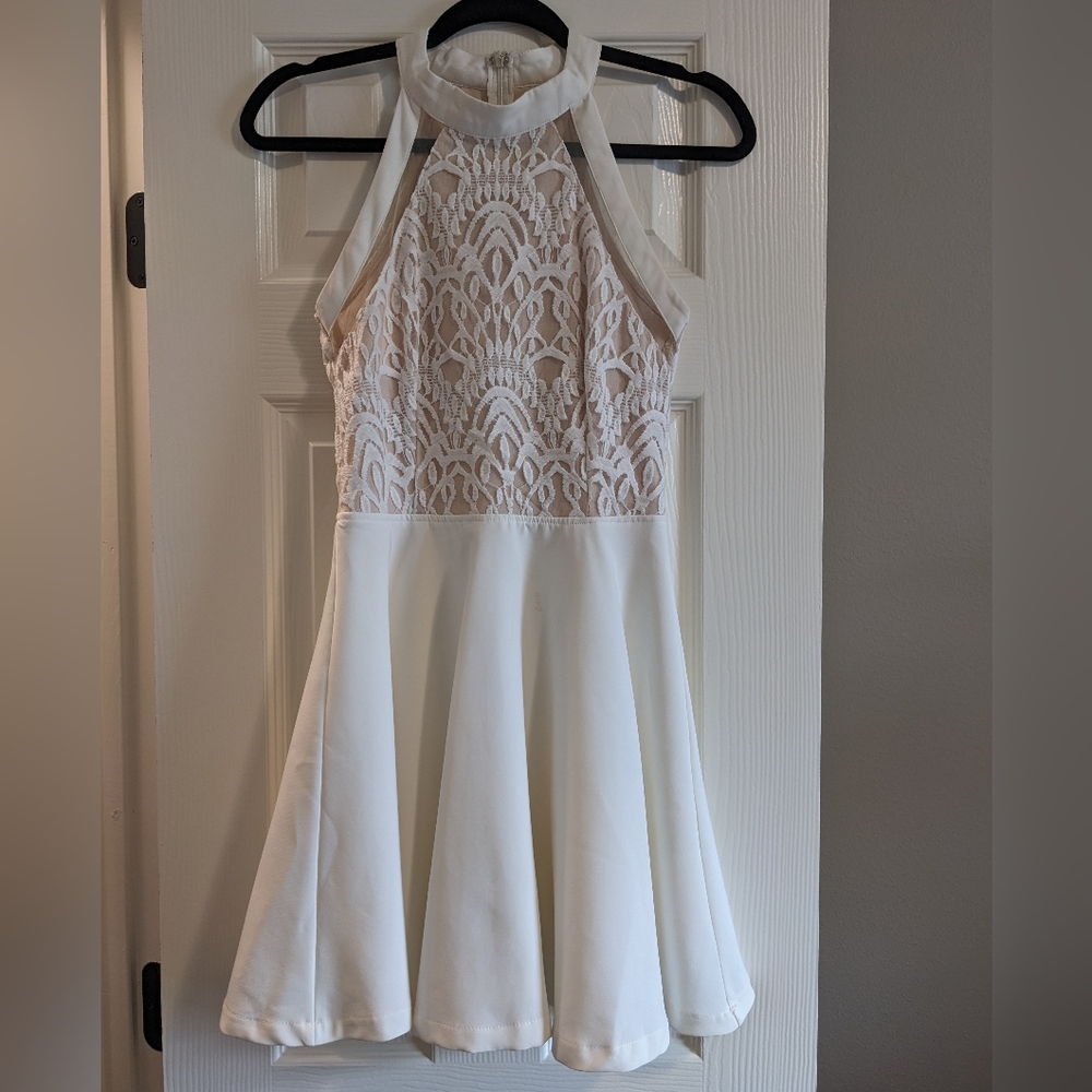 Boutique size 4 White Dress with Tulle underlay.